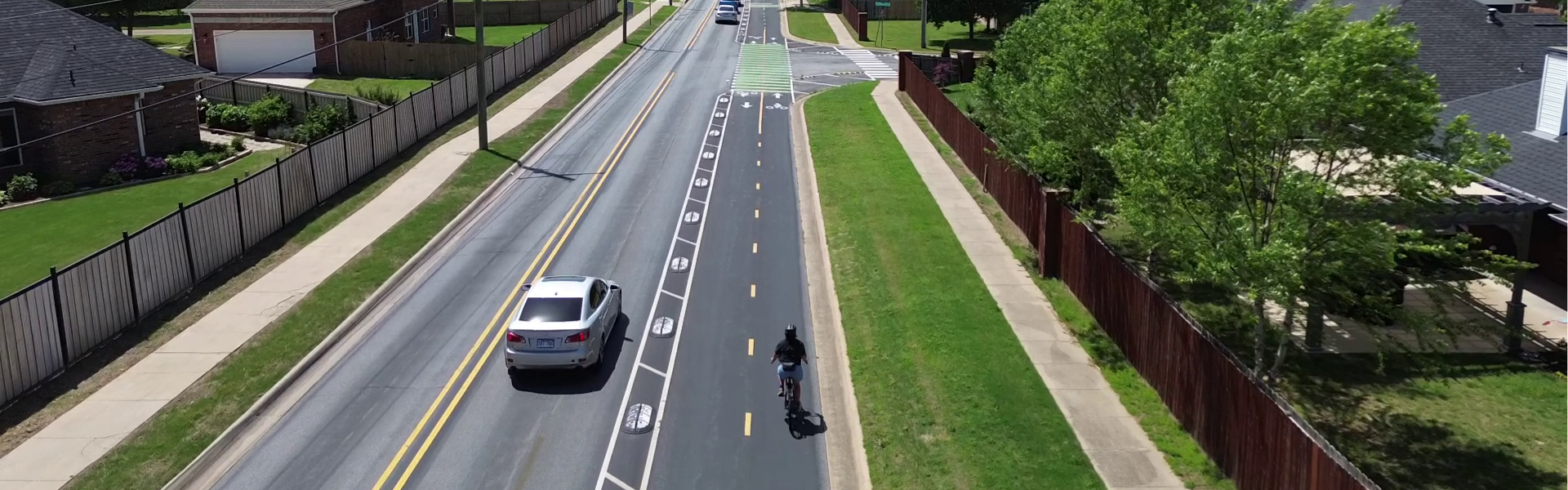 Banner image of an example of an e-bike and how it can be used to transport everyday items you might transport in a automobile